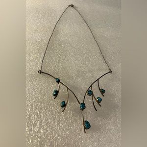 Vintage Native American turquoise and sterling necklace. Marked with ZZ Sterling